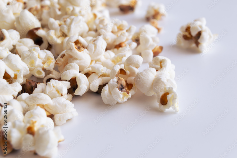 Fresh popcorn with copy space on the white background.