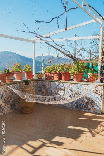 beautiful boho view with hammock in Italy