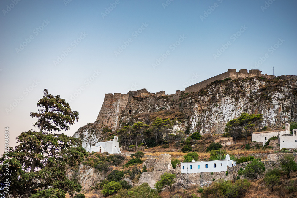 Aerial panoramic view over Chora, Kythira and the Castle in Kythira island, Greece at sunset