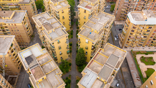 Photography Aerial view of yellow buildings in Garbatella district, Rome, Italy