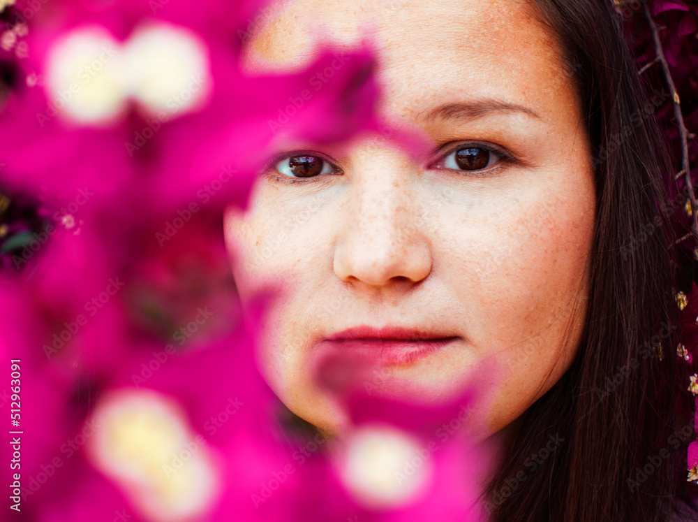 young pretty brunette girl surrounded by purple flowers, lifstyle people touristic season young pretty brunette girl surrounded by purple flowers, lifstyle people touristic season