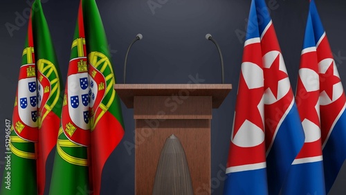 Fototapeta Naklejka Na Ścianę i Meble -  Flags of Portugal and North Korea at international meeting or negotiations press conference. Podium speaker tribune with flags and coat arms. 3d rendering