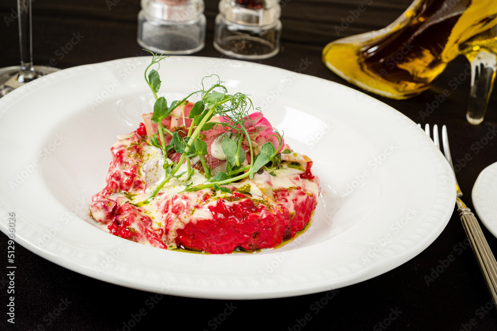 orzotto cooked from pearl barley with beets orzotto cooked from pearl barley with beets