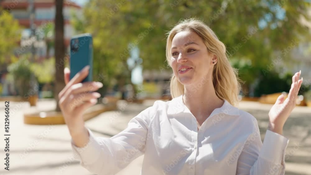 Young blonde woman smiling confident having video call at park Young blonde woman smiling confident having video call at park