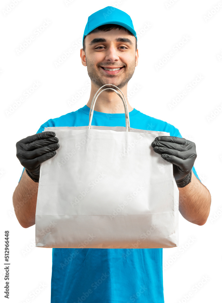 Delivery man with paper bag. Courier in uniform cap and t-shirt, gloves service fast delivering orders. Young guy holding a cardboard package. Character on isolated white background for mockup design Delivery man with paper bag. Courier in uniform cap and t-shirt, gloves service fast delivering orders. Young guy holding a cardboard package. Character on isolated white background for mockup design