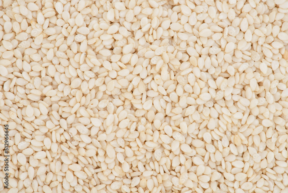 White sesame seeds ,texture and surface background.