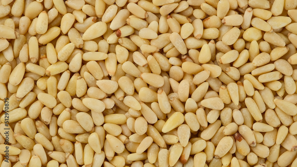 Pine nuts. Whole peeled pine nuts close up Pine nuts. Whole peeled pine nuts close up