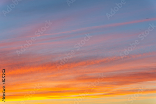 Fototapeta Naklejka Na Ścianę i Meble -  The setting sun in a colored sky.