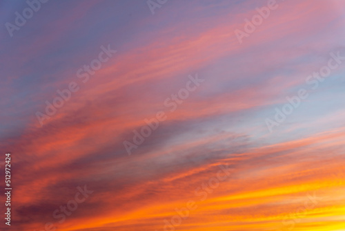 The setting sun in a colored sky. © Senatorek