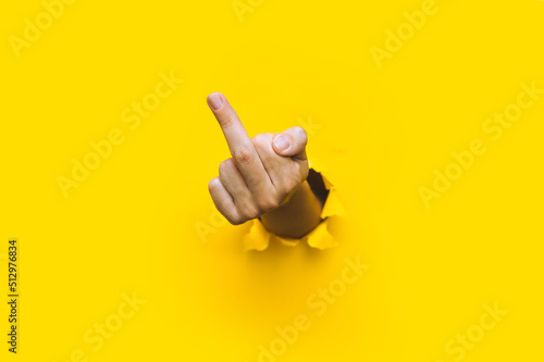 Fotografering Middle finger of left hand, insulting gesture