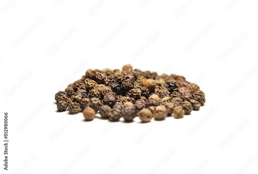 Black pepper isolated on white, a view of a pile of dried black pepper isolated on white background Black pepper isolated on white, a view of a pile of dried black pepper isolated on white background