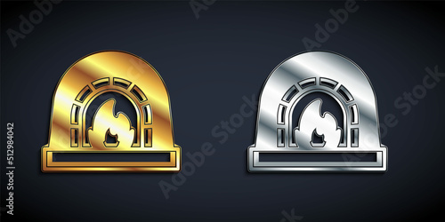 Gold and silver Blacksmith oven icon isolated on black background. Long shadow style. Vector