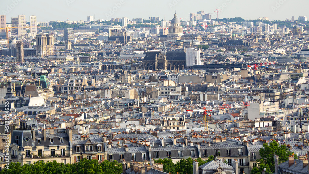 Paris, France. Amazing landscape to the city from the hill of Sacré-Coeur. Summer time. view of the buildings and the roof of Paris
