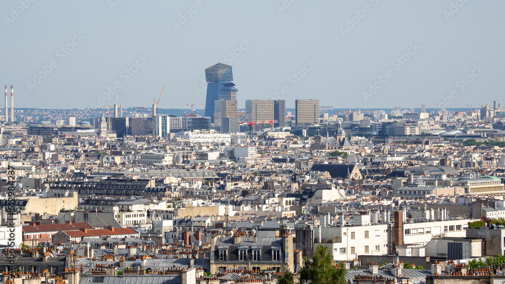Paris, France. Amazing landscape to the city from the hill of Sacré-Coeur. Summer time. view of the buildings and the roof of Paris