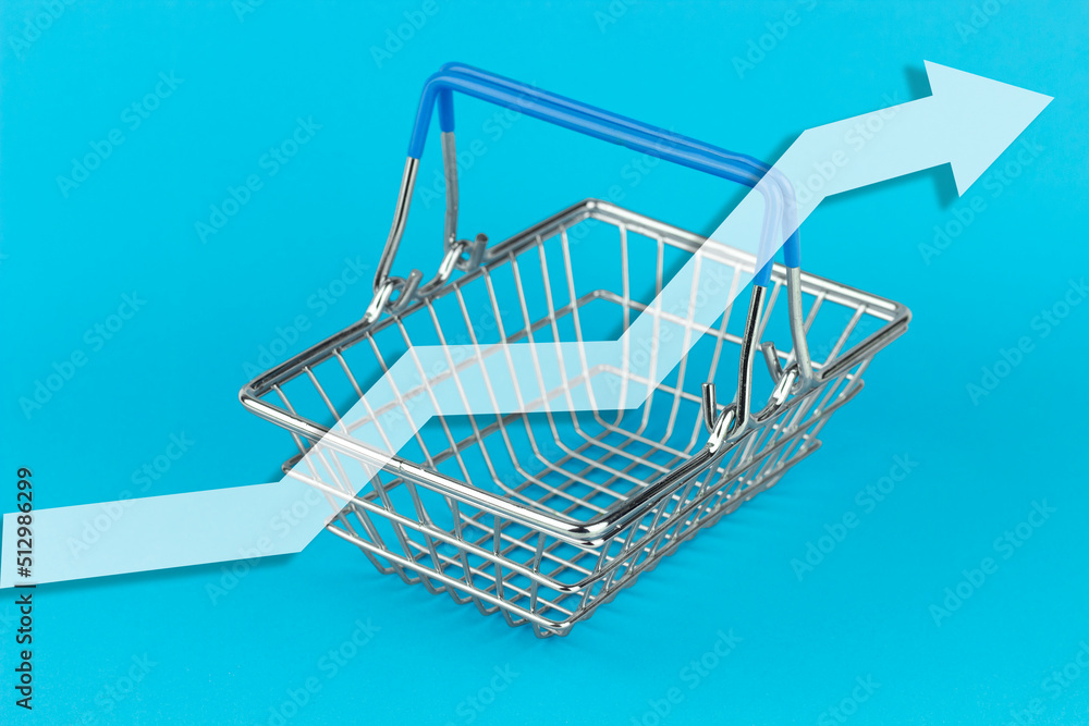 rise in standard of living, decline in food prices, decline in consumer basket prices, increase graph against the background of a supermarket basket on a blue background rise in standard of living, decline in food prices, decline in consumer basket prices, increase graph against the background of a supermarket basket on a blue background