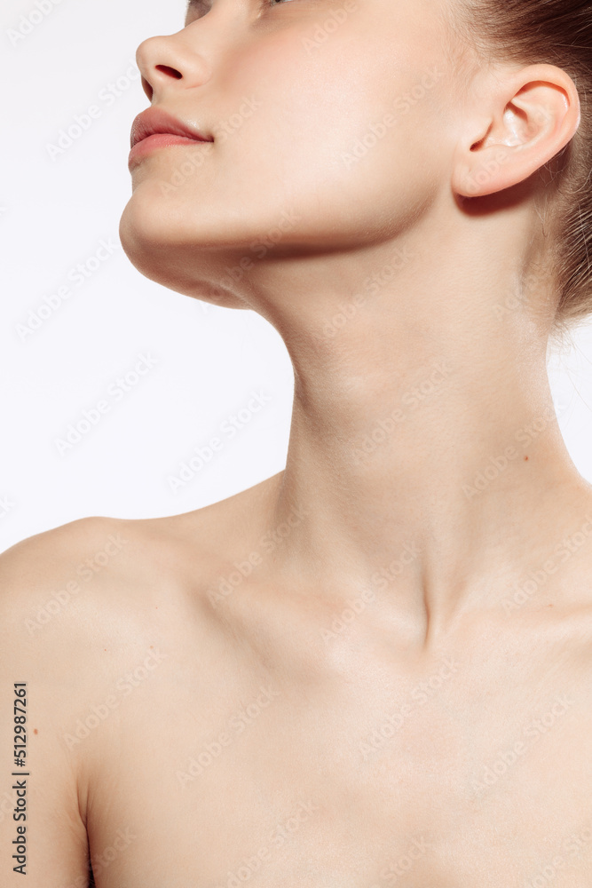 Portrait of young, beautiful and healthy girl with well-kept skin isolated on white background. The spa, surgery, face lifting and skin care concept Portrait of young, beautiful and healthy girl with well-kept skin isolated on white background. The spa, surgery, face lifting and skin care concept