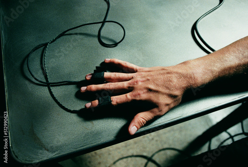 Hand connected to polygraph test photo