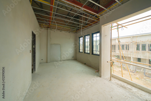 Empty under construction room in home or house with space on site. Interior. Old unfurnished room rental property  living space units. lifestyle. Renovation.
