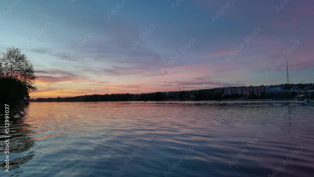 Sunrise over the river near the shore Sunrise over the river near the shore