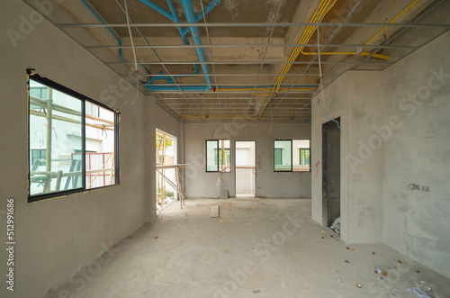 Empty under construction room in home or house with space on site. Interior. Old unfurnished room rental property, living space units. lifestyle. Renovation.