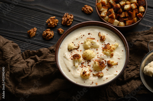 Creamy cauliflower soup with fried cauliflower and croutons.
