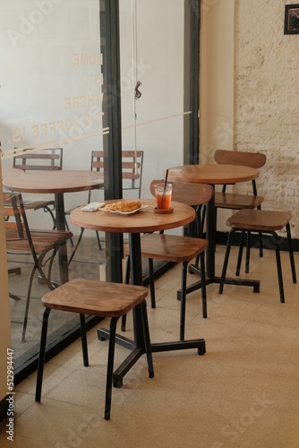 table and chairs in a restaurant © yulen