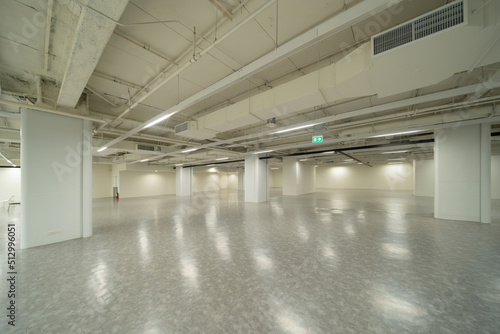 Empty room in shopping mall hall with space. Interior design. New modern room rental property, living space units. lifestyle.