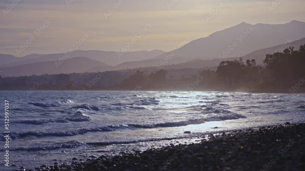 Slow motion waves on the coastline of Marbella, Spain Slow motion waves on the coastline of Marbella, Spain