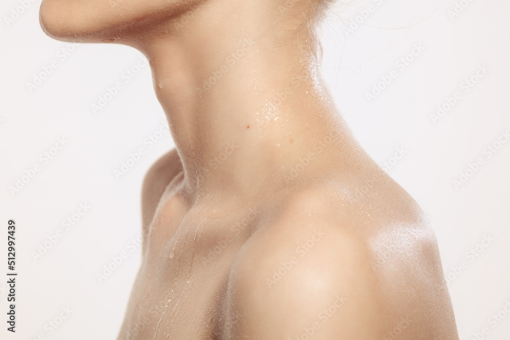 Cropped image of young, healthy girl with well-kept skin isolated on white background. The spa, surgery, face lifting and skin care concept Cropped image of young, healthy girl with well-kept skin isolated on white background. The spa, surgery, face lifting and skin care concept