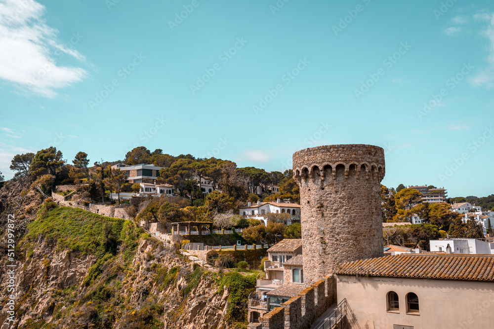 Aerial view of fortress in Tossa de Mar, Costa Brava, Spain. Historical coastal old town on a hill near Mediterranean Sea