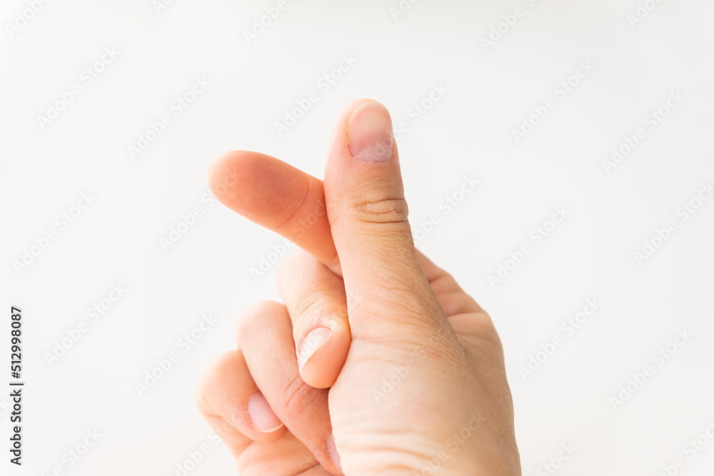 A hand signs gesture to be little heart from tip of thumb and index finger  on white background Photos | Adobe Stock