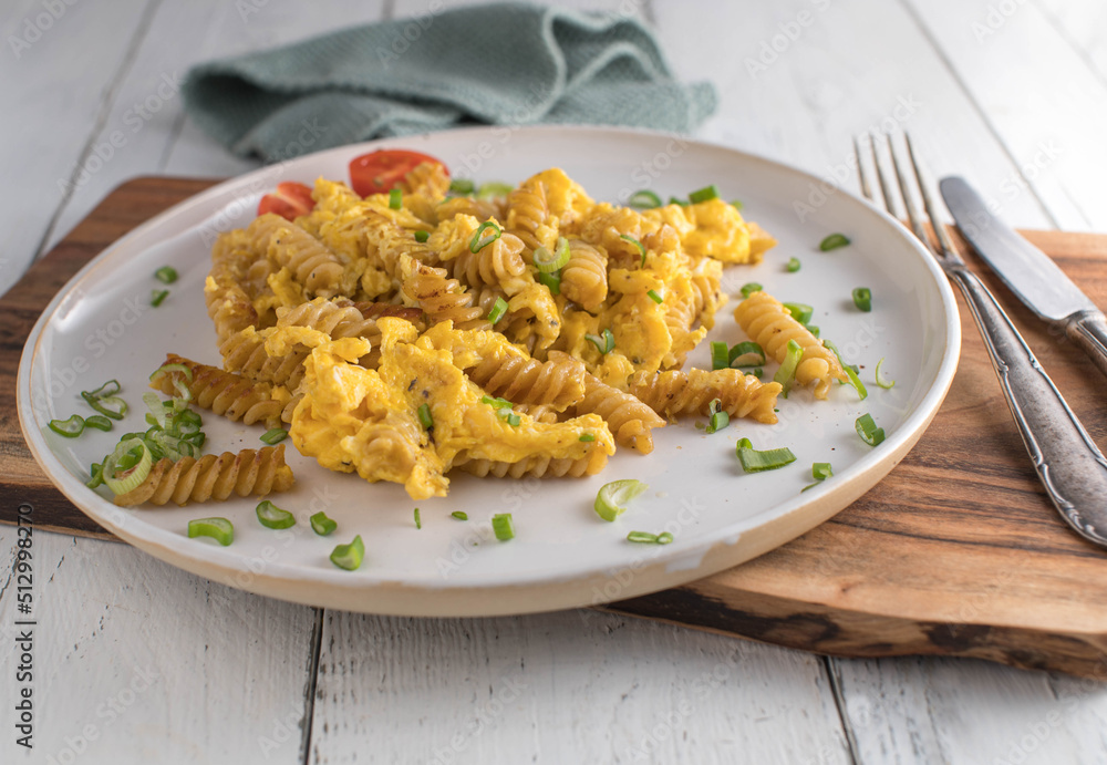 Whole wheat noodles with scrambled eggs. Healthy and cheap meal Whole wheat noodles with scrambled eggs. Healthy and cheap meal