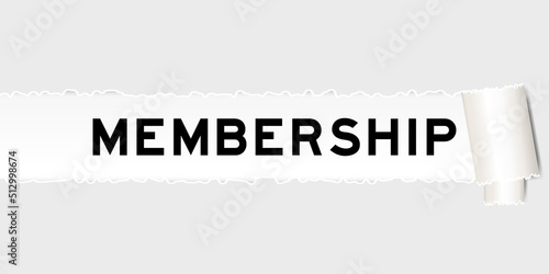 Ripped gray paper background that have word membership under torn part
