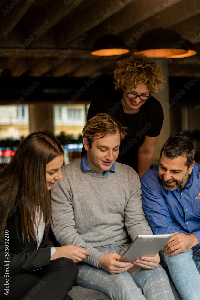 Having a discussion about the plans and ideas for the company in the cafe