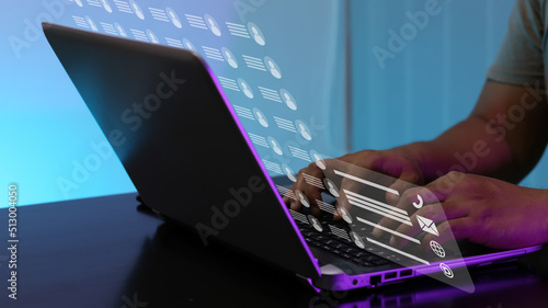 Φωτογραφία User typing on a laptop with virtual screen of directory contact