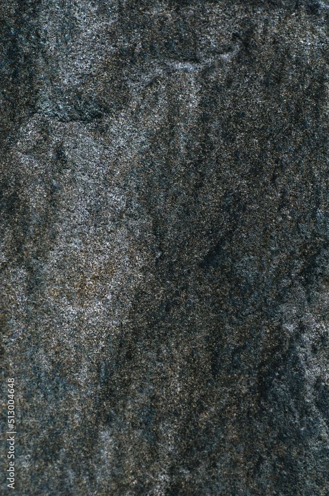 Rock. Background texture of dark stone closeup. Top view, stone from embankment in Poti. Rock. Background texture of dark stone closeup. Top view, stone from embankment in Poti.