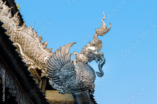 Beautiful carved patterns of silver metal in northern Thailand temples.