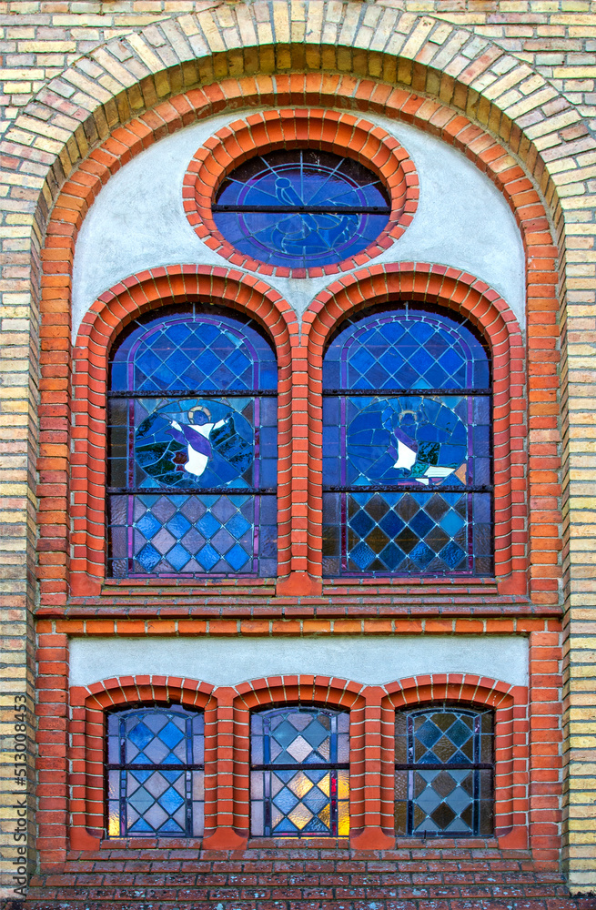 Obraz premium Architectural details of the Catholic Church of Our Lady of the Rosary built in 1895 in the neo-Gothic style in Bajtkowo in Masuria, Poland.