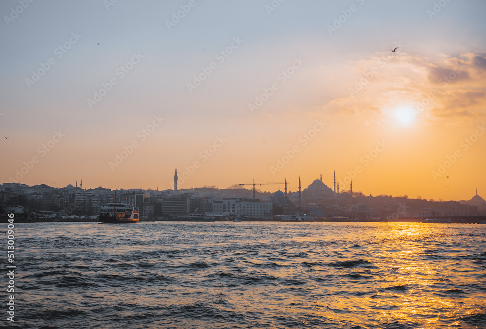 beautiful sunset view from the Ship in Istanbul on Hagia Sophia and the blue mosque in Background. 