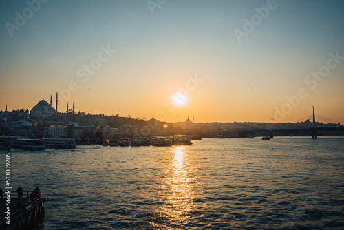 beautiful sunset view in Istanbul with many Mosques, bridges and the old city in Background. 