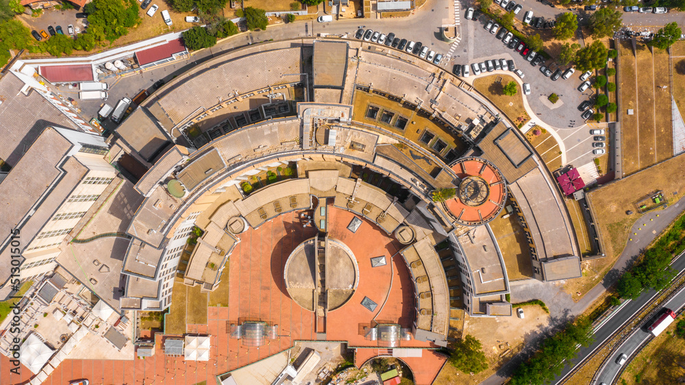 Perpendicular aerial view on a semicircular building.