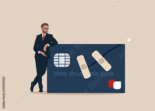 Confidence man stand with fixed and repaired credit card with bandage. Credit repair, process to fixing poor credit standing, recover from financial mistake or negotiate with lender.