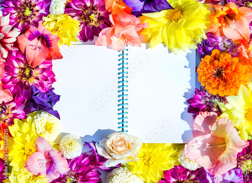 White space for text in the form of a notebook in a frame of bright colors