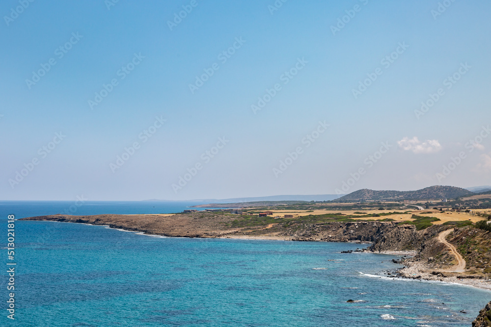 A high angle view over the coastline and ocean, on the northern side of the Karpas Peninsula in Cyprus