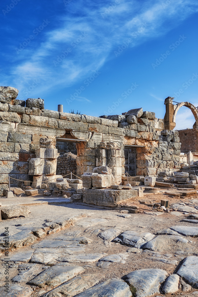 Ancient city ruins of Ephesus in Turkey in the day. Traveling abroad and overseas for holiday, vacation and tourism. Excavated remains of historical stone building from Turkish history and culture