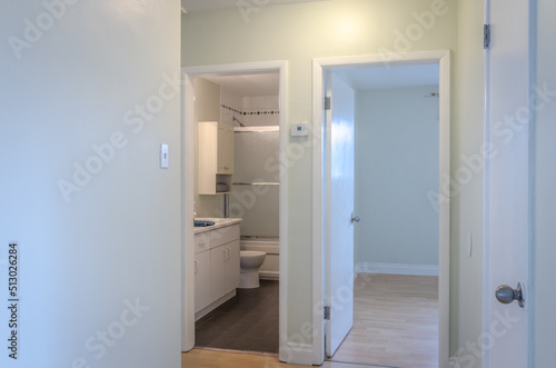 hallway to bedroom and bathroom interior showcase home.