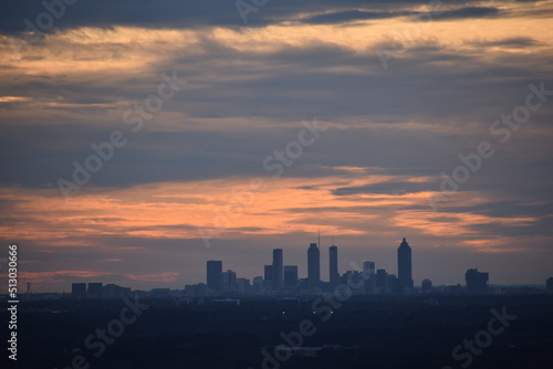 Summit of Stone Mountain Park, GA at sunset gazing over the city 