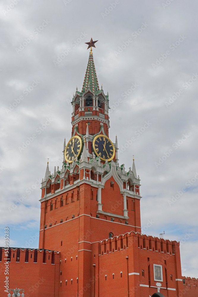 The Spasskaya Tower of the Moscow Kremlin on Red Square, with huge clock and five stars on top - The five-pointed red star has often served as a symbol of communism in Russia. The Spasskaya Tower of the Moscow Kremlin on Red Square, with huge clock and five stars on top - The five-pointed red star has often served as a symbol of communism in Russia.