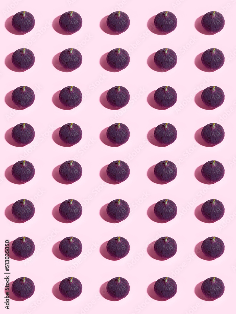 Colorful fruit pattern of fresh figs on purple pastel background, top view, flat lay Colorful fruit pattern of fresh figs on purple pastel background, top view, flat lay