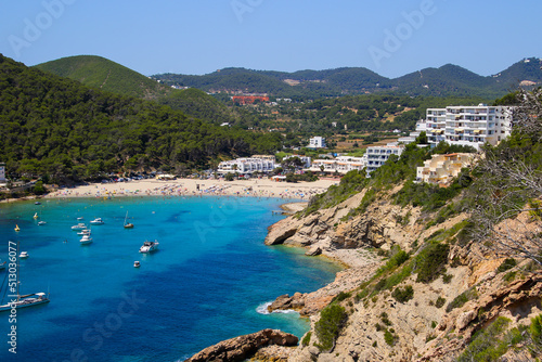 Cala Llonga bay on the southern side of Ibiza in the Balearic islands in the Mediterranean Sea - Cove with turquoise waters surrounded with pine covered hills